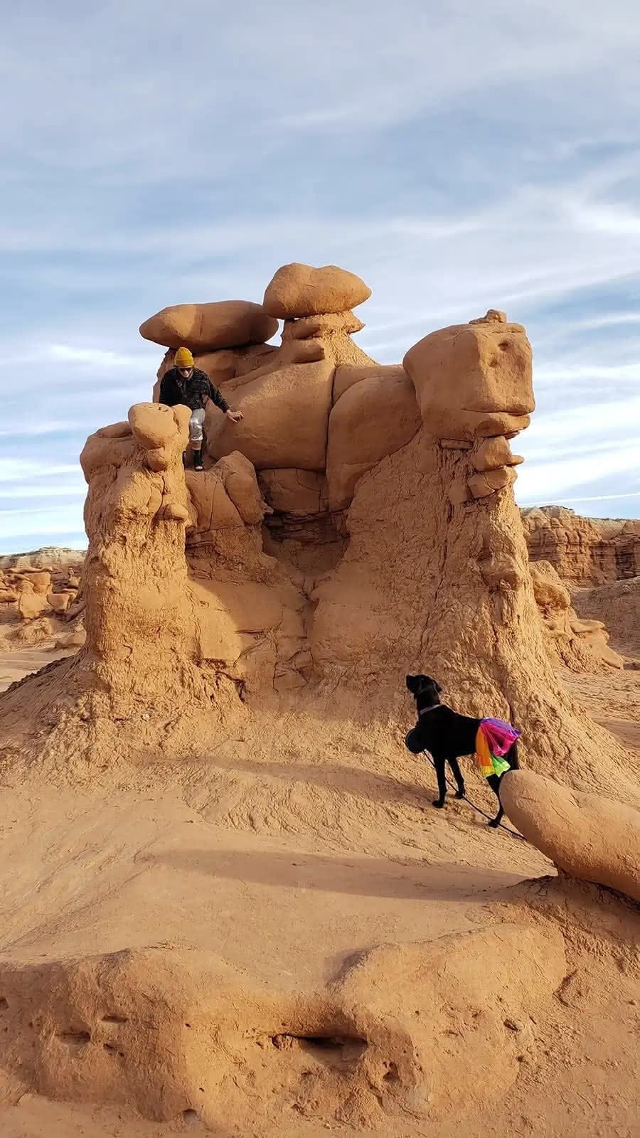 Ellie in a tutu at goblin valley looking at Kellie